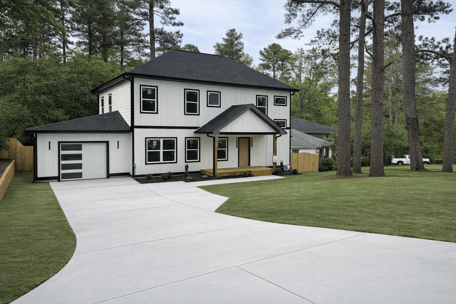 Complete Exterior Renovation & New Concrete Driveway Installation